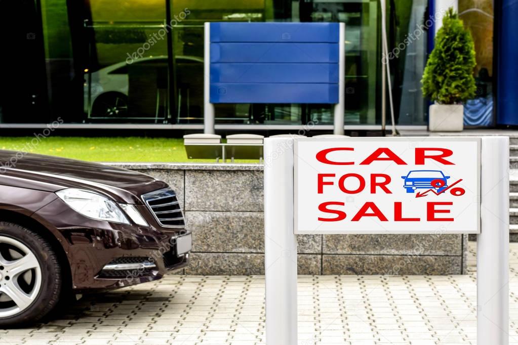 Billboard advertising car sales . The concept of changes in market prices