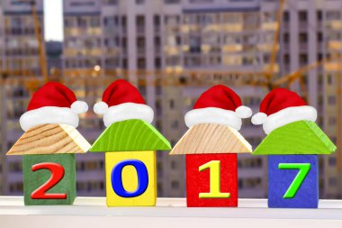 İnşaat bir arka plan üzerinde ahşap küpleri . 