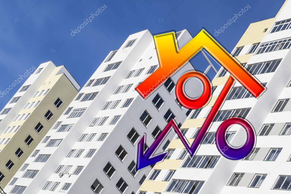 The percent sign in the background of a new residential building . 