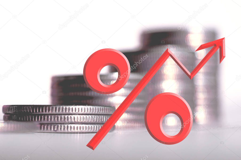 The symbol of percent on the background of money .