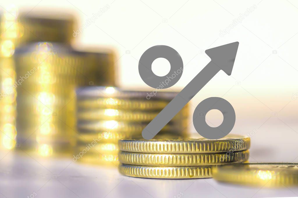 The symbol of interest on the background of money . The concept of changes in Bank rates .