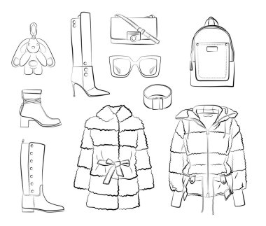 Kışlık giysiler ve aksesuarlar beyaz arka planda izole edilmiş. Siyah ve beyaz renkler. Şapka, fular, ayakkabılar, güneş gözlükleri, çantalar, debriyaj, kürk manto, ceket, botlar. Sonbahar ve bahar kadın kıyafetleri