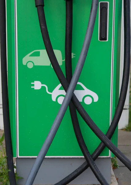 a green car charger station for electric cars
