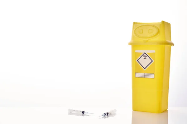 Large Yellow Sharpsbin Container Right Two Syringes Needles Front Centre — 스톡 사진