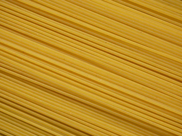Rohtrockene Spaghetti gerade als Hintergrund — Stockfoto