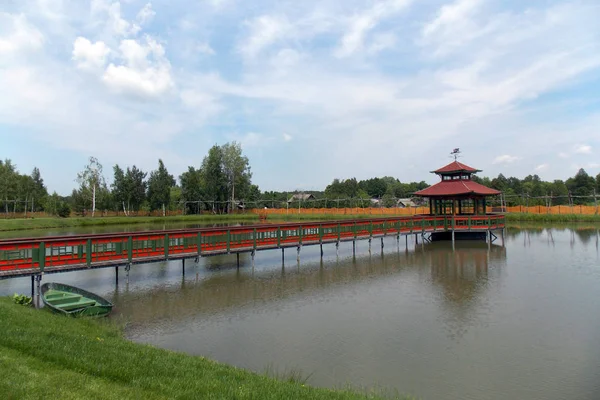Asian style park. Bridge over the lake.