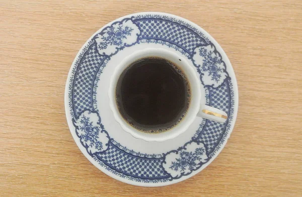 Top Kilátás Egy Kávéscsésze Egy Asztalon — Stock Fotó