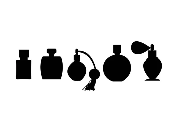 Beyaz üzerine parfüm şişeleri