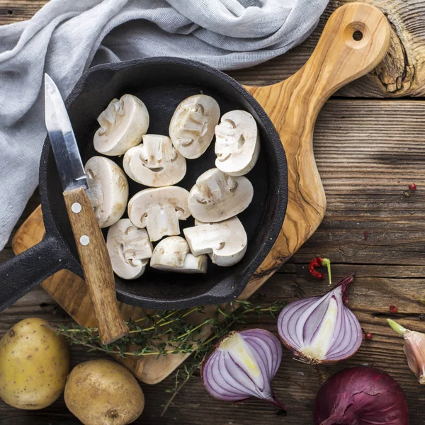 Ingredients with fresh mushrooms on wooden background — Stock Photo, Image