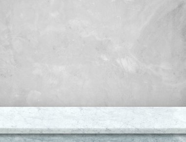 Beyaz mermer masa üstü gri beton duvar ile alay için boş.