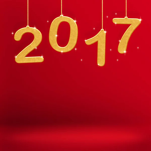 2017 nyår guld färg hängande på röda studio room, Holiday gree — Stockfoto