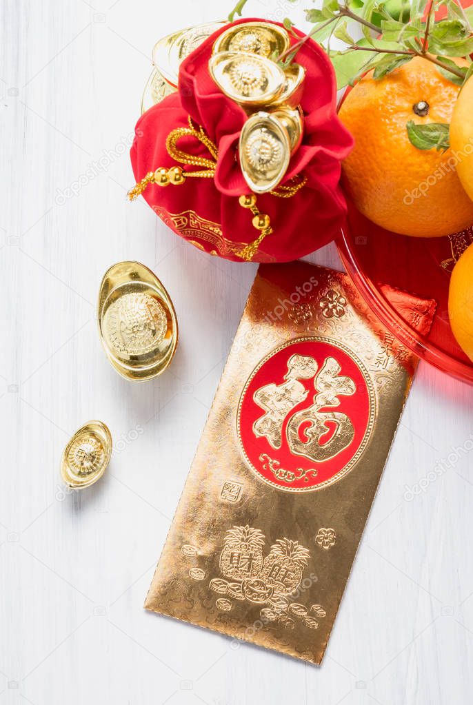 Chinese New year,golden envelope packet (ang pow) and red felt f
