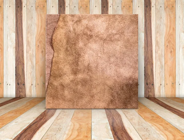Square leather canvas leaning at wood plank floor and wall,Mock