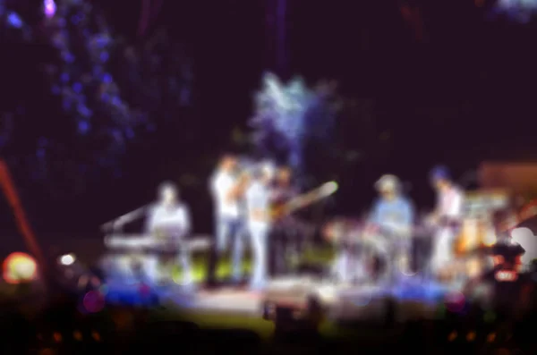 Blur background of live music at garden with bokeh light — Stock Photo, Image