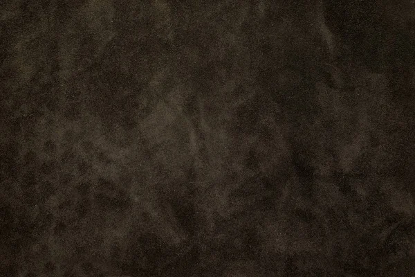 在深色的棕色麂皮绒皮革纹理背景关门 — 图库照片