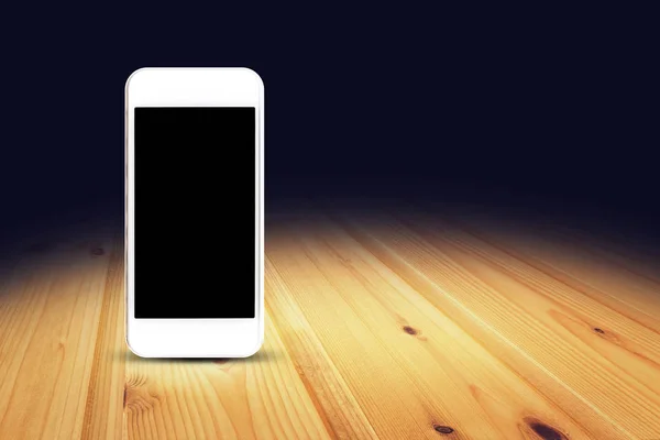 Mobile phone on wood floor perspective background for display or