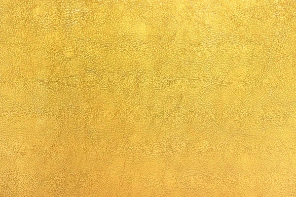 Luminoso colore oro pelle texture sfondo — Foto Stock