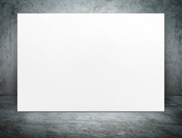 Blank white paper poster canvas at grunge concrete room,Mock up template for adding your content or design,Business presentation