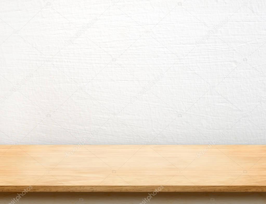 Empty wood table top with white concrete wall,Mock up for displa