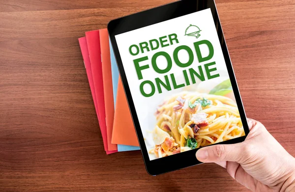 Close up Two hand holding tablet with order food online word, Di — Stock Photo, Image