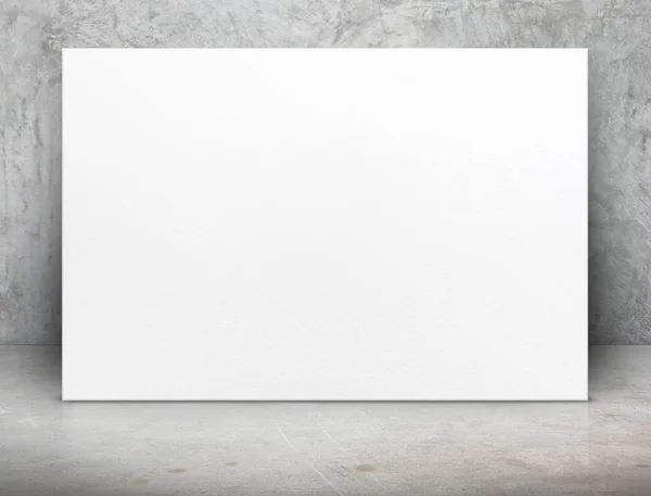 Blank white paper poster canvas at grunge concrete room,Mock up — Stock Photo, Image