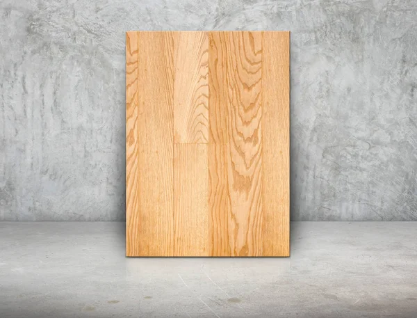 Quadro de bloco de madeira em branco inclinado na parede de concreto cinza grunge e — Fotografia de Stock