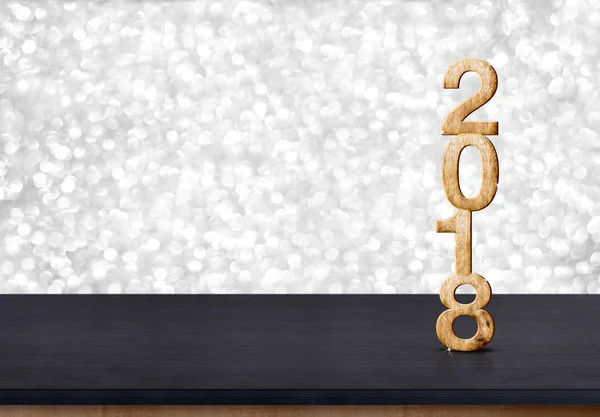 2018 new year wood number on wood table with sparkling silver bo — Stock Photo, Image