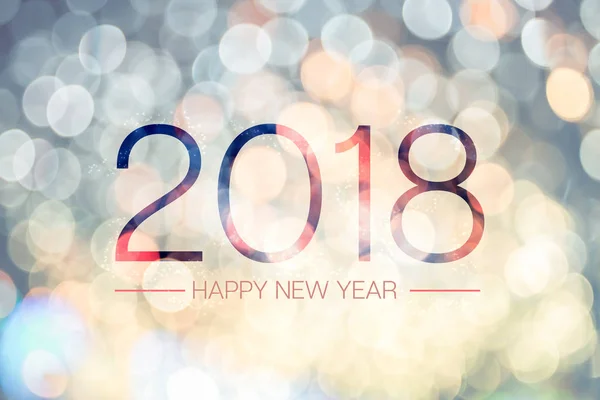 Feliz ano novo 2018 com pálido amarelo bokeh luz espumante backg — Fotografia de Stock