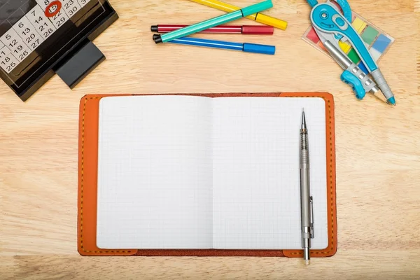 Top view of notebook with mechanical pencil and marker pen,calen — Stock Photo, Image