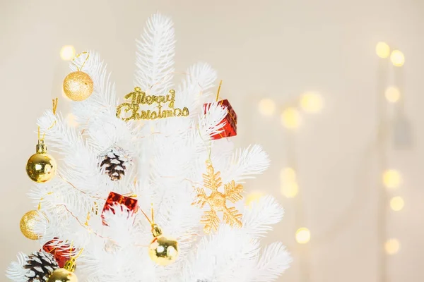 White Christmas tree decoration with Gold snowflake and ball pin — Stock Photo, Image