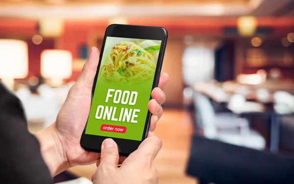 Close up hand holding mobile phone with order food online word o — Stock Photo, Image