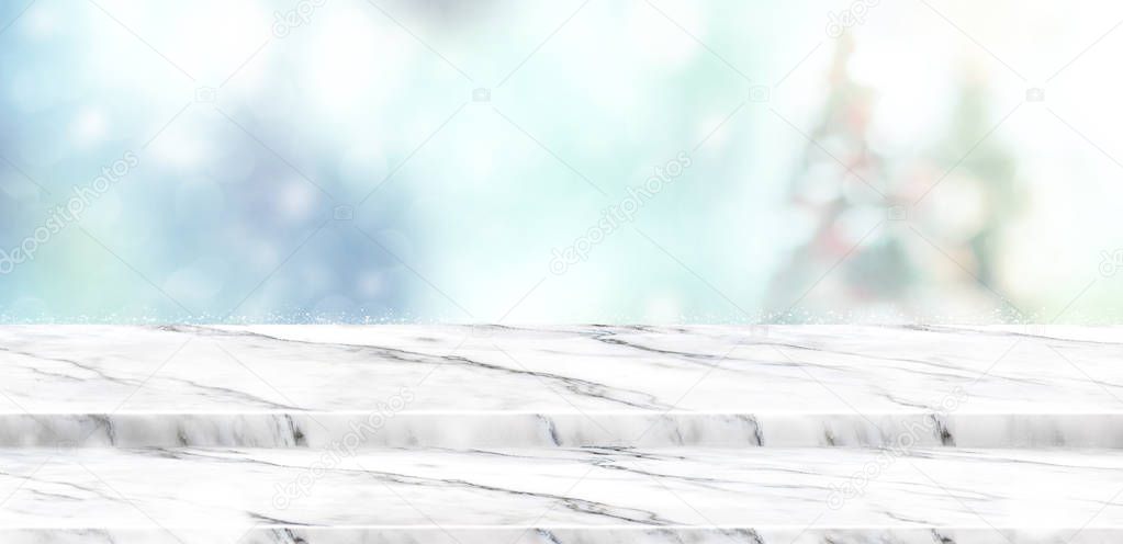 Empty step white marble table top with abstract muted blur chris