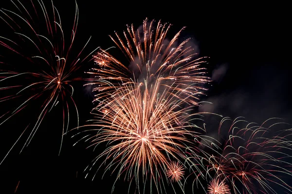 Firework blast in dark sky at night celebration new year,count d