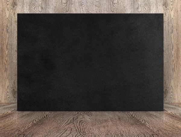 Blank banner black canvas poster leaning at wood wall on wooden — Stock Photo, Image