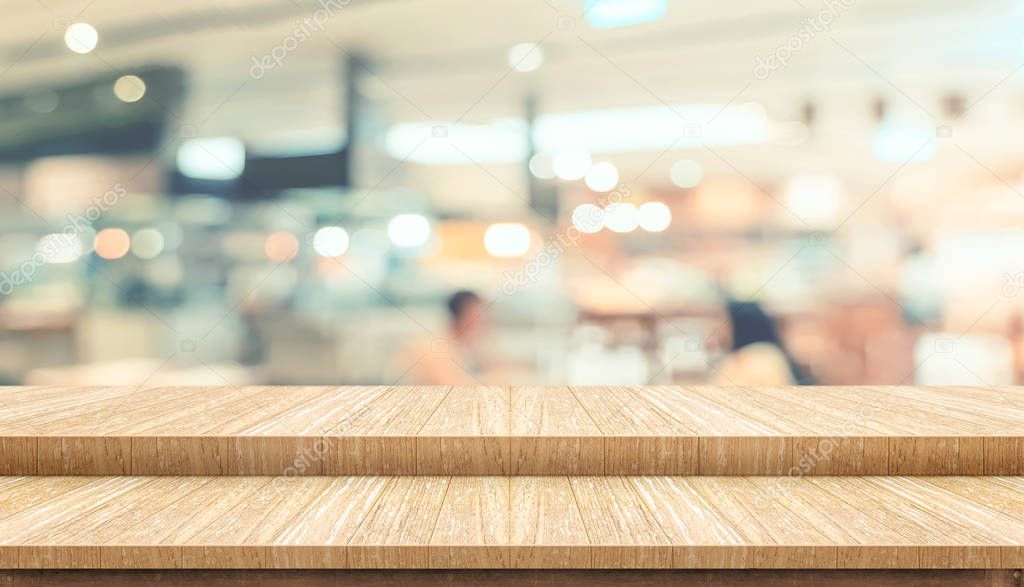 Empty step plank wood table top food stand with blur cafe restau