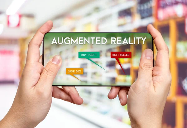 Hand hold mobile phone and using augmented reality ( AR ) app fo — Stock Photo, Image