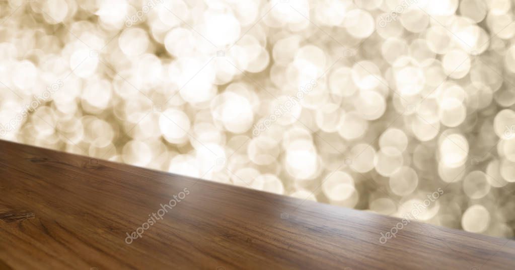 Empty old rustic angle wood table top with blur sparkling gold b