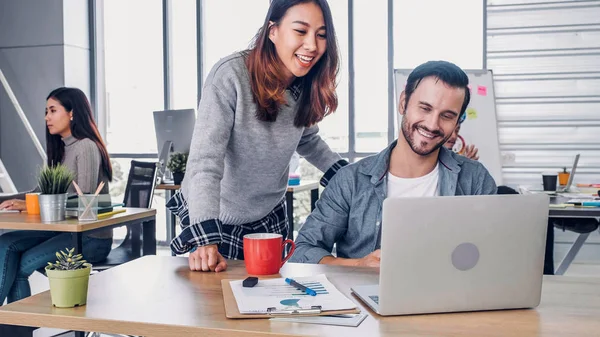 Two of creative designer casual meeting with laptop at modern of — Stock Photo, Image