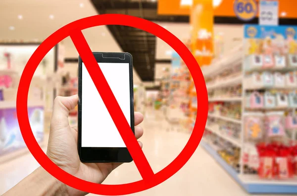 ban symbol use phone on super market background