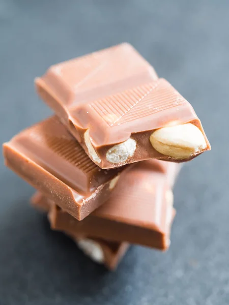 Chocolate bar with hazelnuts — Stock Photo, Image