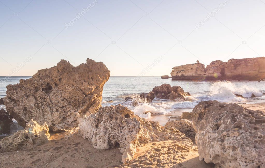 beautiful rocky Sao Rafael beach or Praia de Sao Rafael with clean blue water in Algarve region, Portugal. 