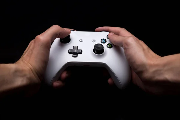 Mans Hand Holding Wireless Gaming Controller — Stock fotografie