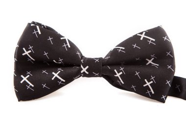 Beyaz arka plan, yakın çekim göz alıcı zarif Aksesuar papyon siyah üzerinde beyaz haçlar ile izole