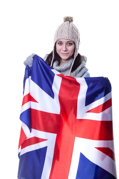 Happy woman holding British flag. isolated on white background — Stock Photo, Image