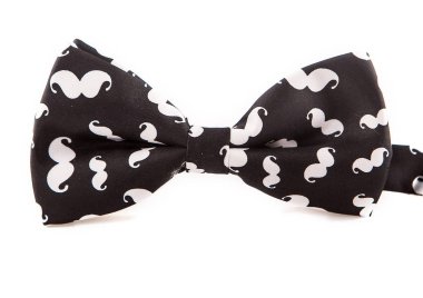 Siyah papyon soyut, beyaz desen, bir yakın çekim, beyaz bir arka plan üzerinde