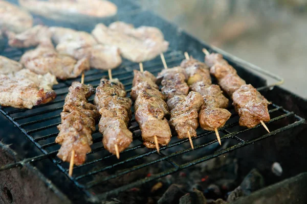 The pork shish kabobs prepared on a brazier for a holiday Stock Picture