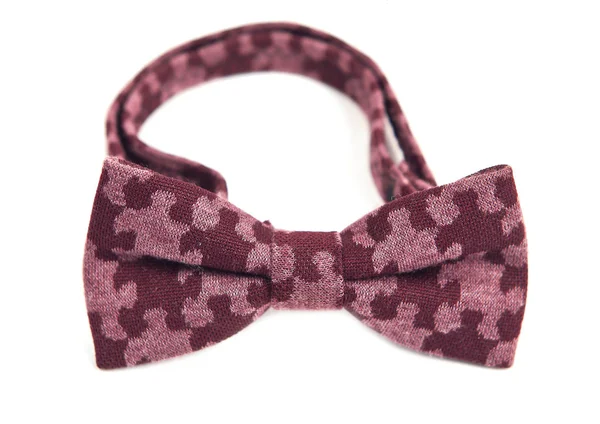Боу краватка в візерунку головоломки, фіолетовий колір і темно-фіолетовий — стокове фото