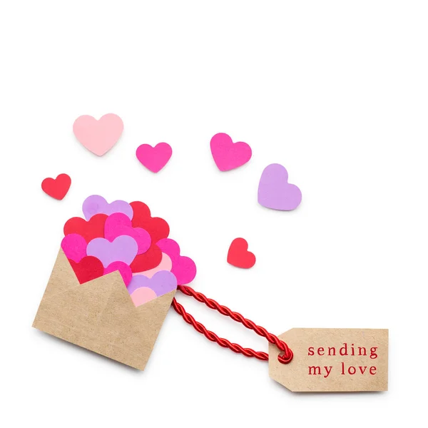 Creative valentines concept photo of  envelope with hearts made of paper on white background. — Stock Photo, Image