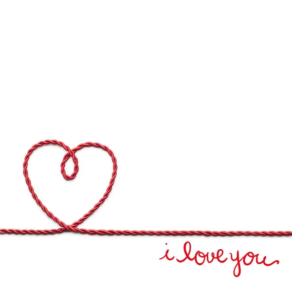 Creative valentines concept photo of a heart mad of rope on white background. — Stock Photo, Image