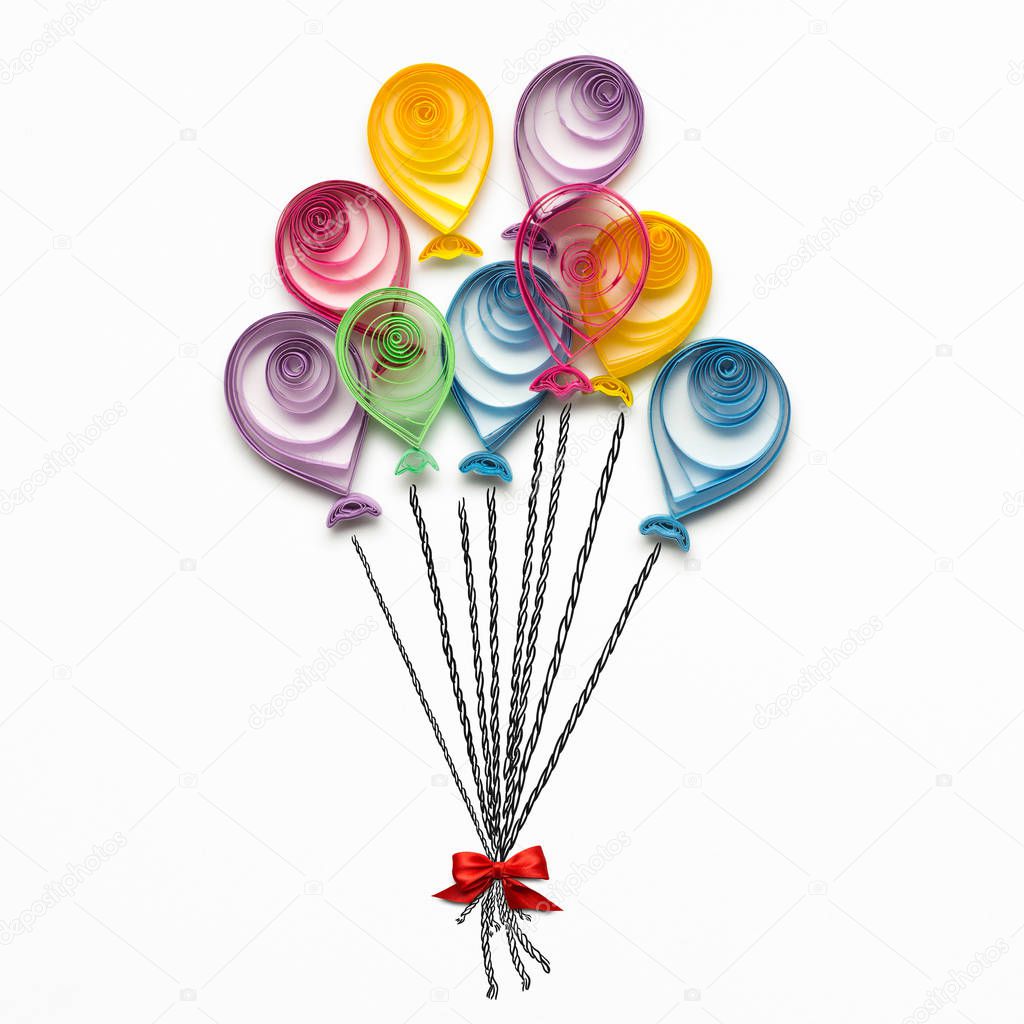 Happy Birthday. Creative concept photo of quilling balloons made of paper on white background.